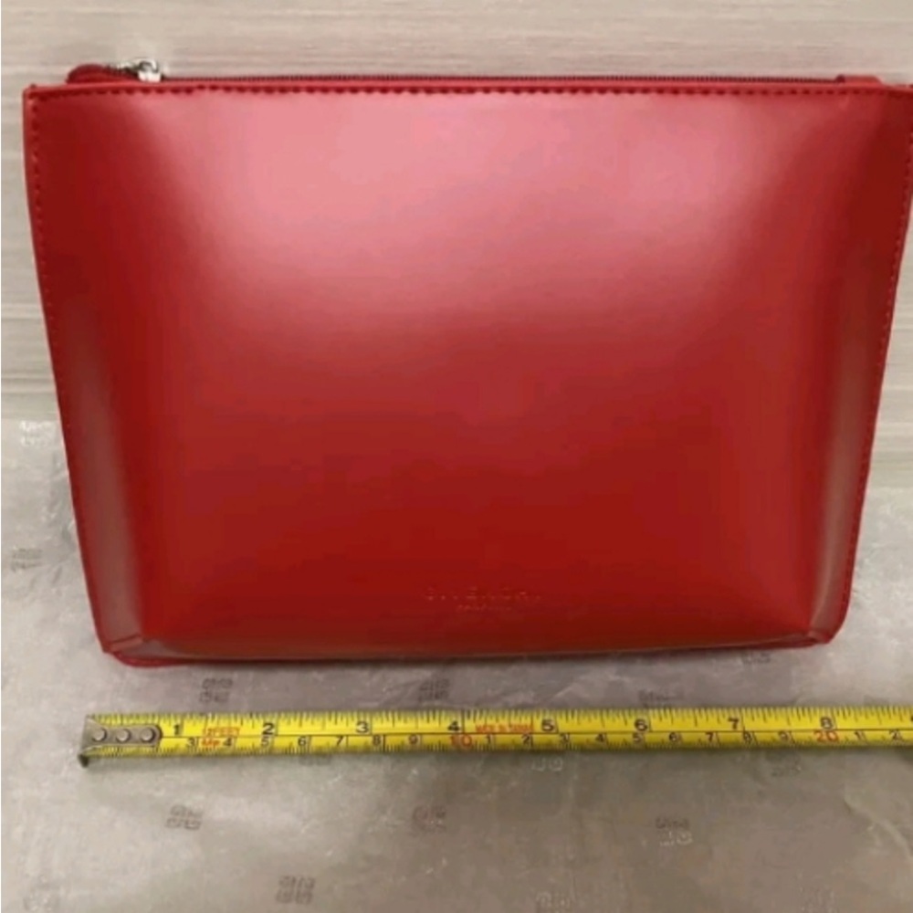 GIVENCHY PARFUMS-
Red Zip Pouch